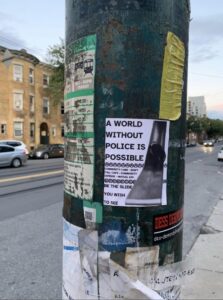 Photo of the "World Without Police is Possible" sticker